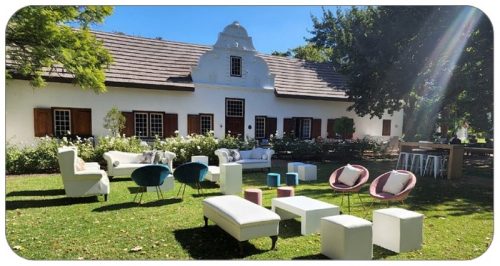 Lounge furniture on lawn on winefarm